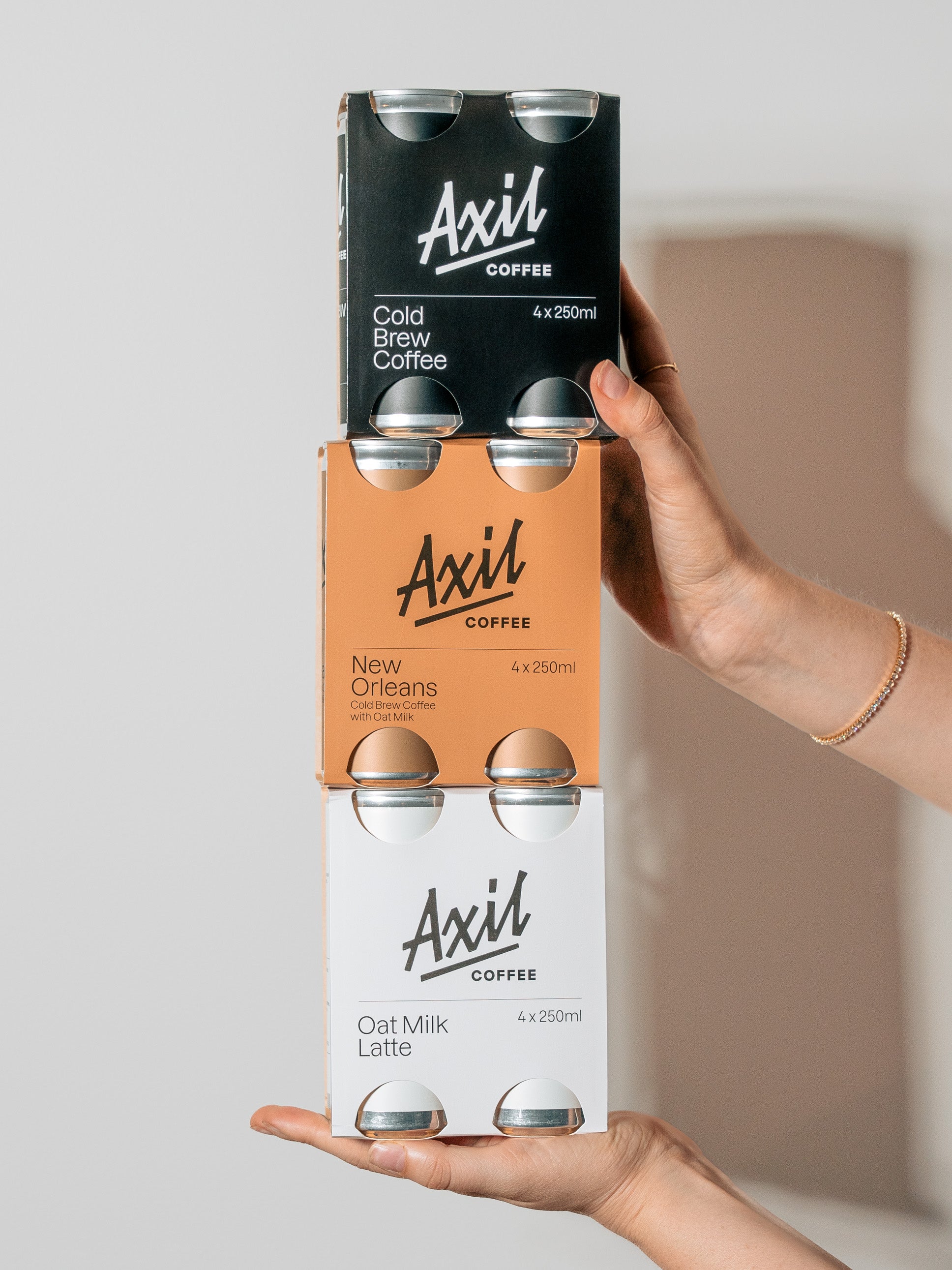 Sip anytime, anywhere. Get to know Axil's Canned Coffee.